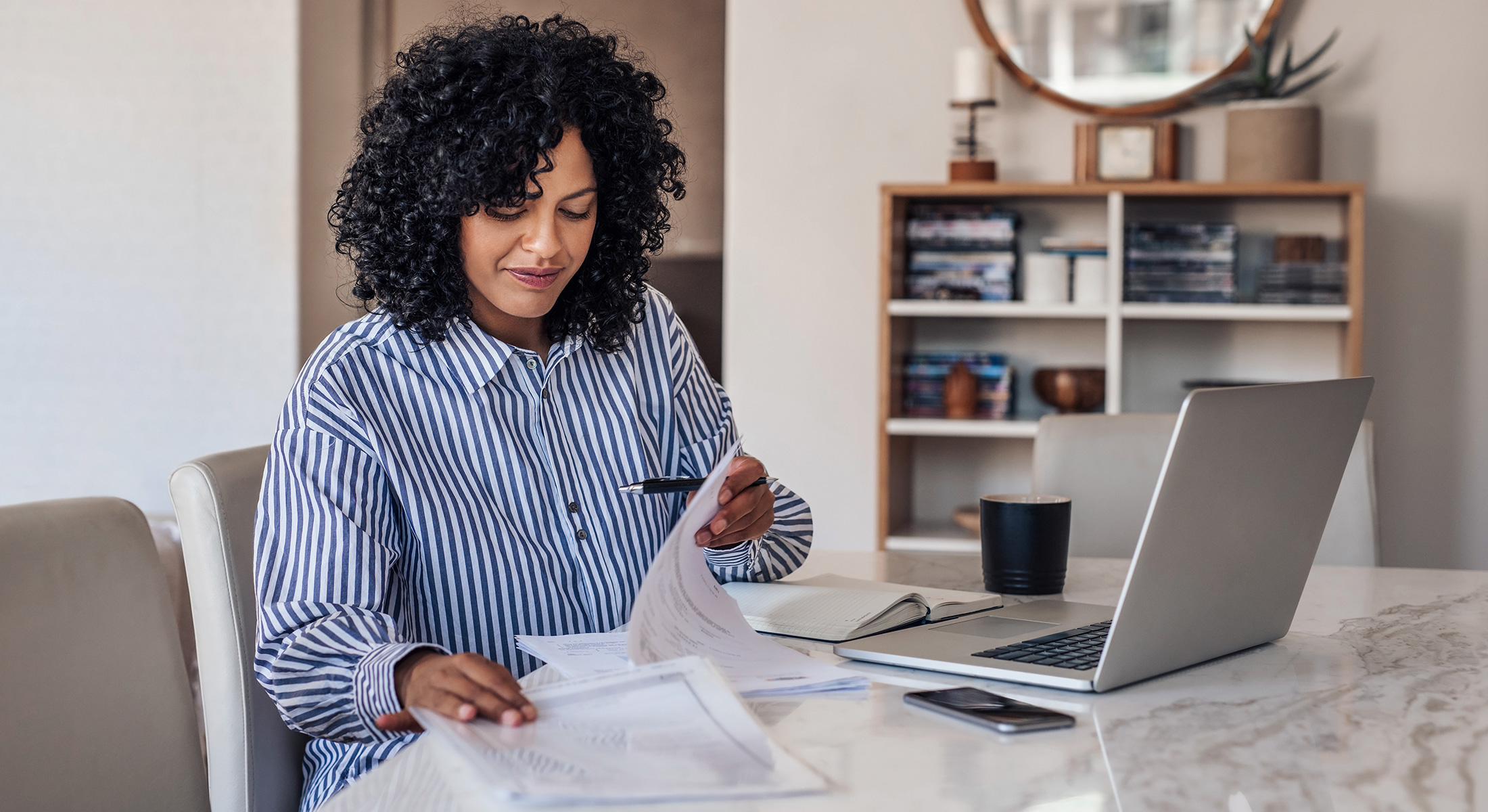 Woman working at home on laptop