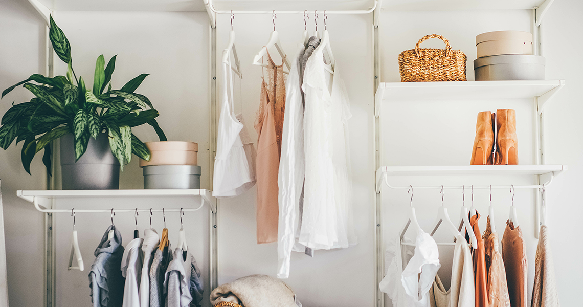 closet shelves and clothes on hangers